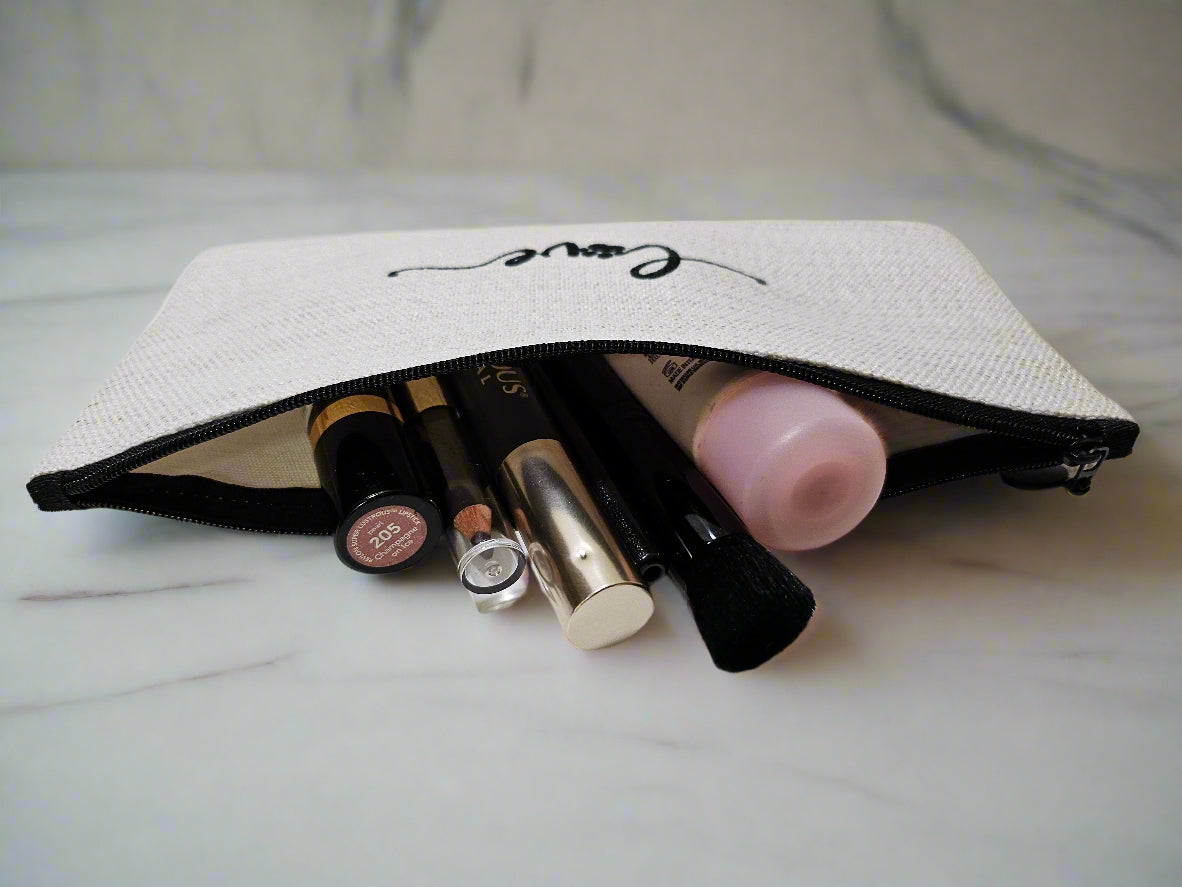 Makeup pouch with various lip products on a white background