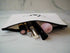 Makeup pouch with various lip products on a white background