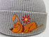 Gray beanie with a cartoon dog and flower design on a white background